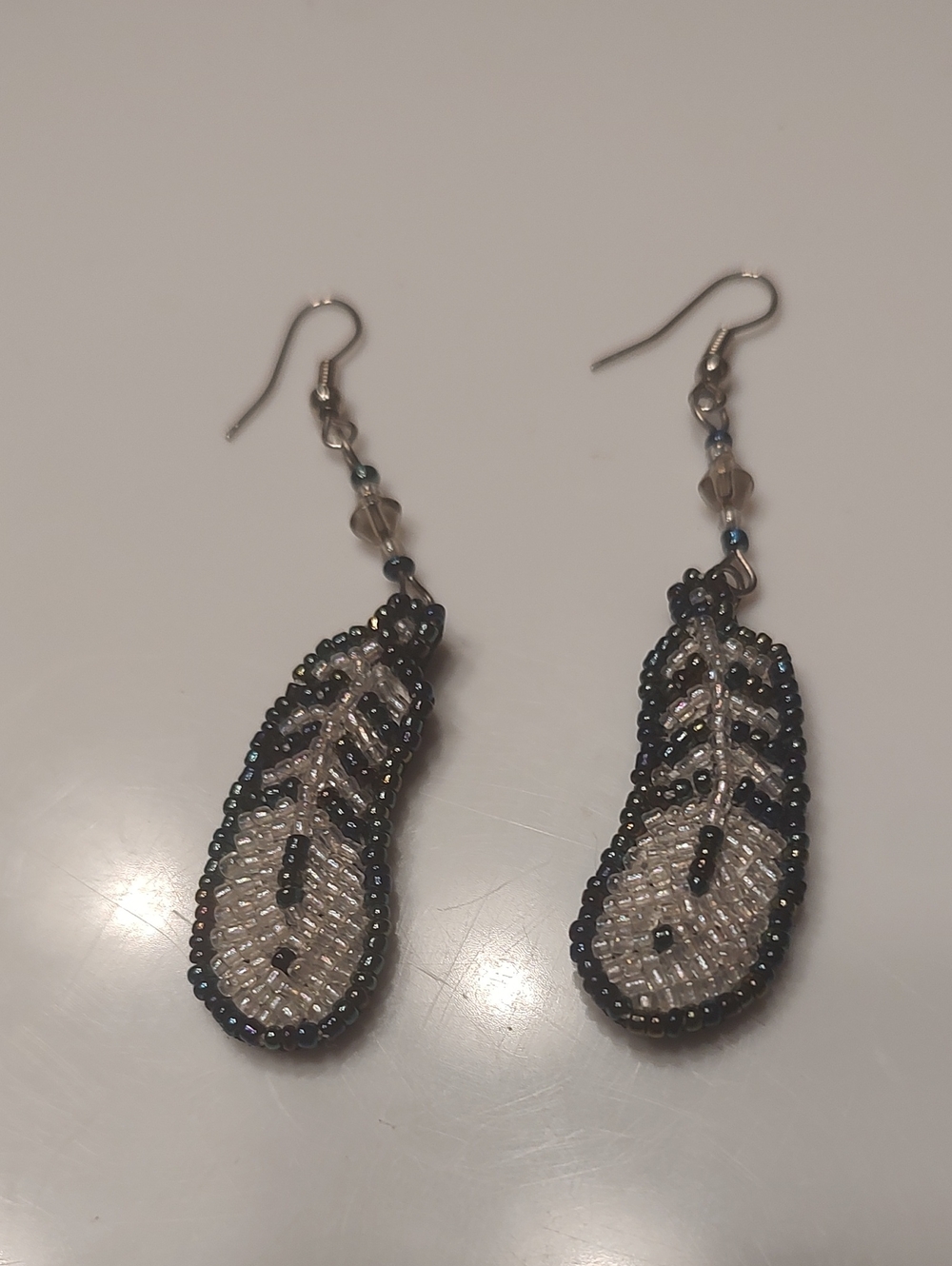 Hand-Beaded Feather Drop Earrings in Black/Blue/Iridescent and White
